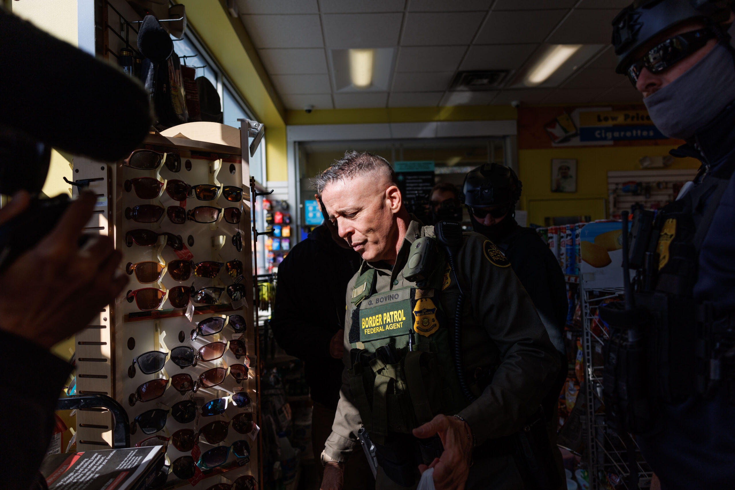 Border Patrol Cmdr. Gregory Bovino leaves a Skokie gas station...