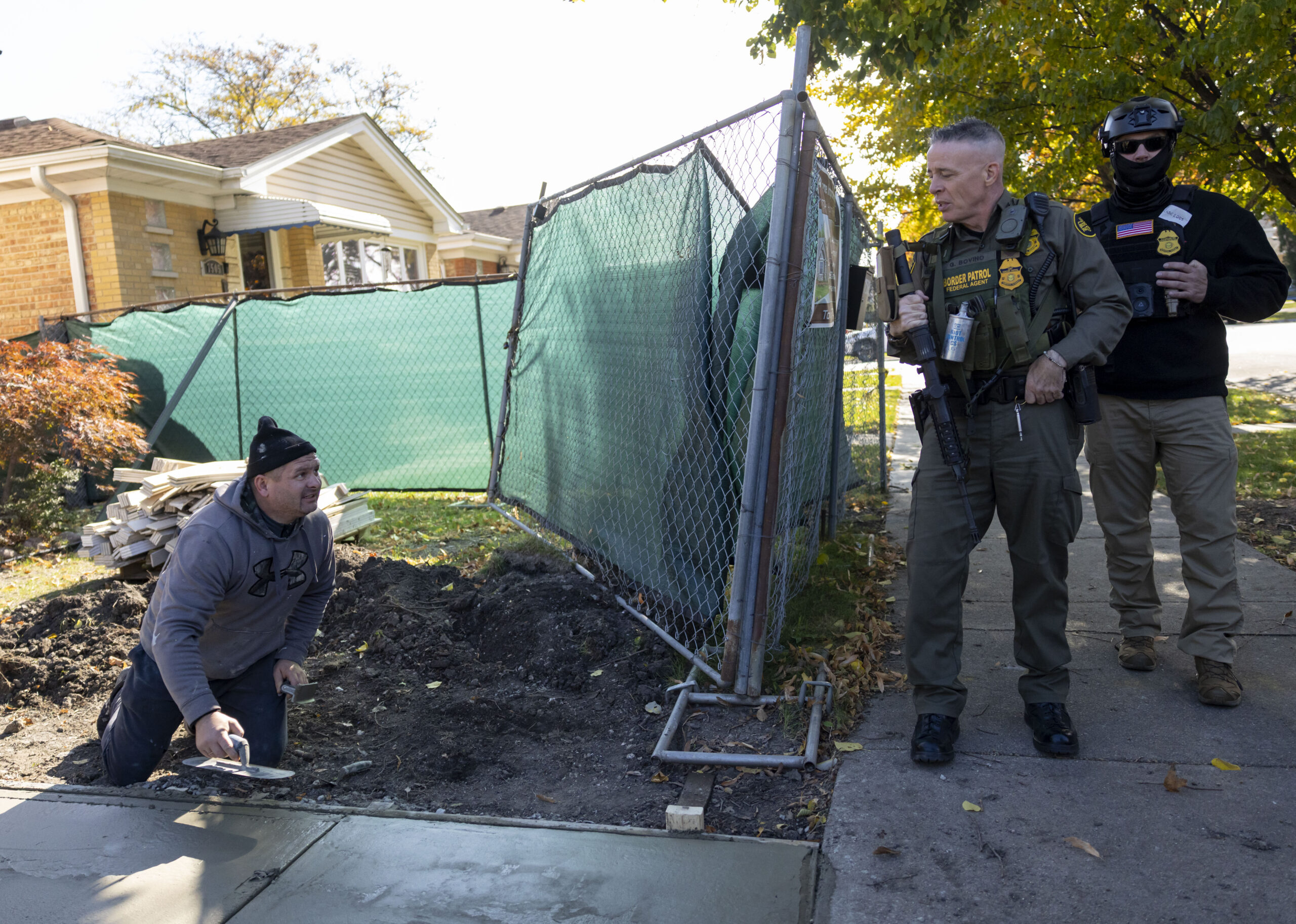 Border Patrol Cmdr. Gregory Bovino makes small talk with a...