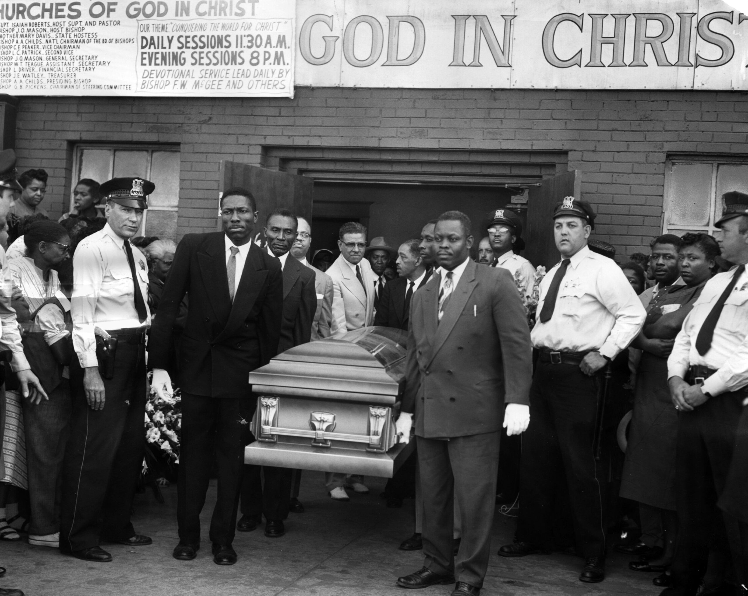 Pallbearers leave Roberts Temple Church of God in Christ at...