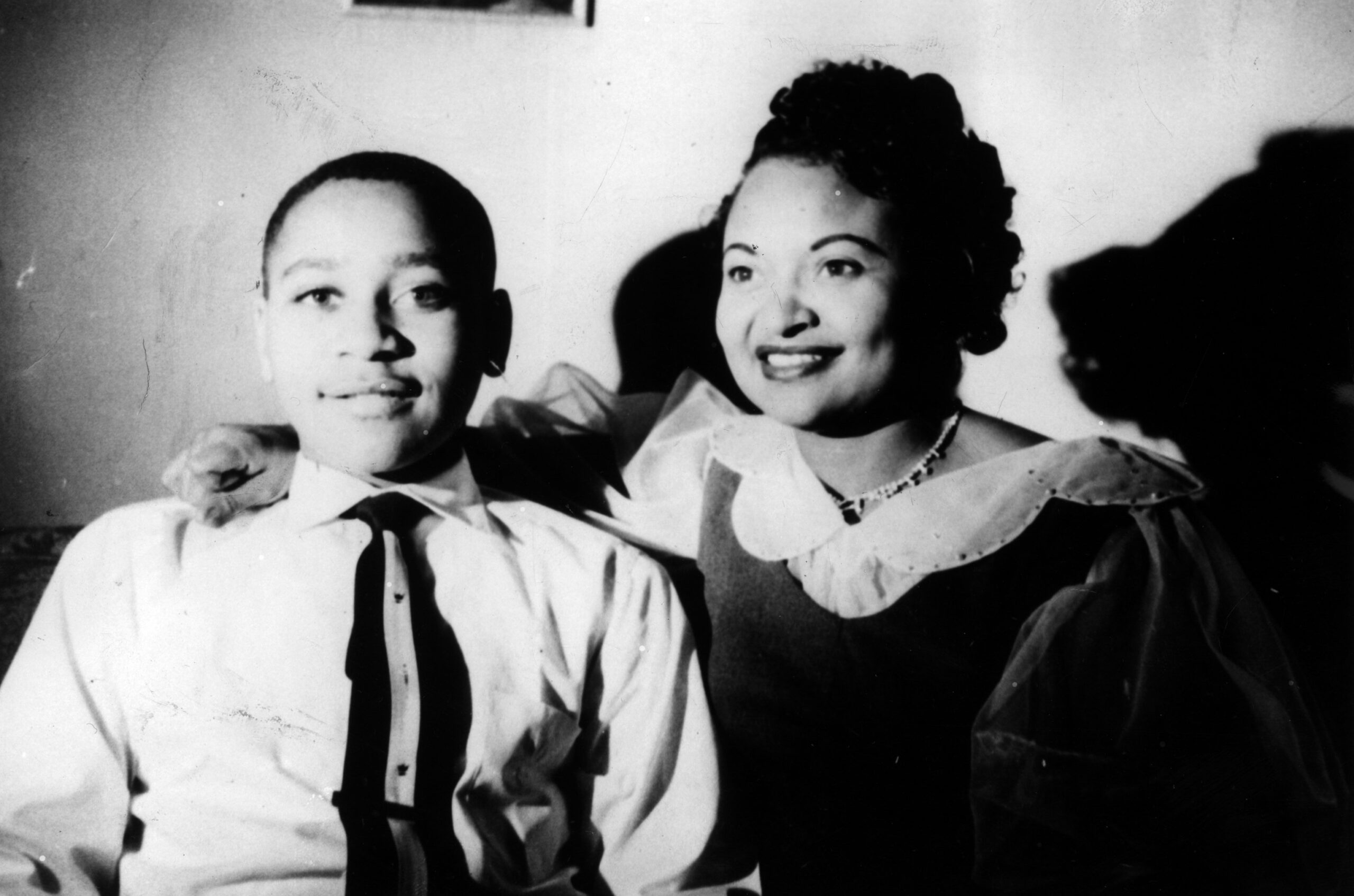 Emmett Louis Till, 14, with his mother, Mamie Bradley, at...
