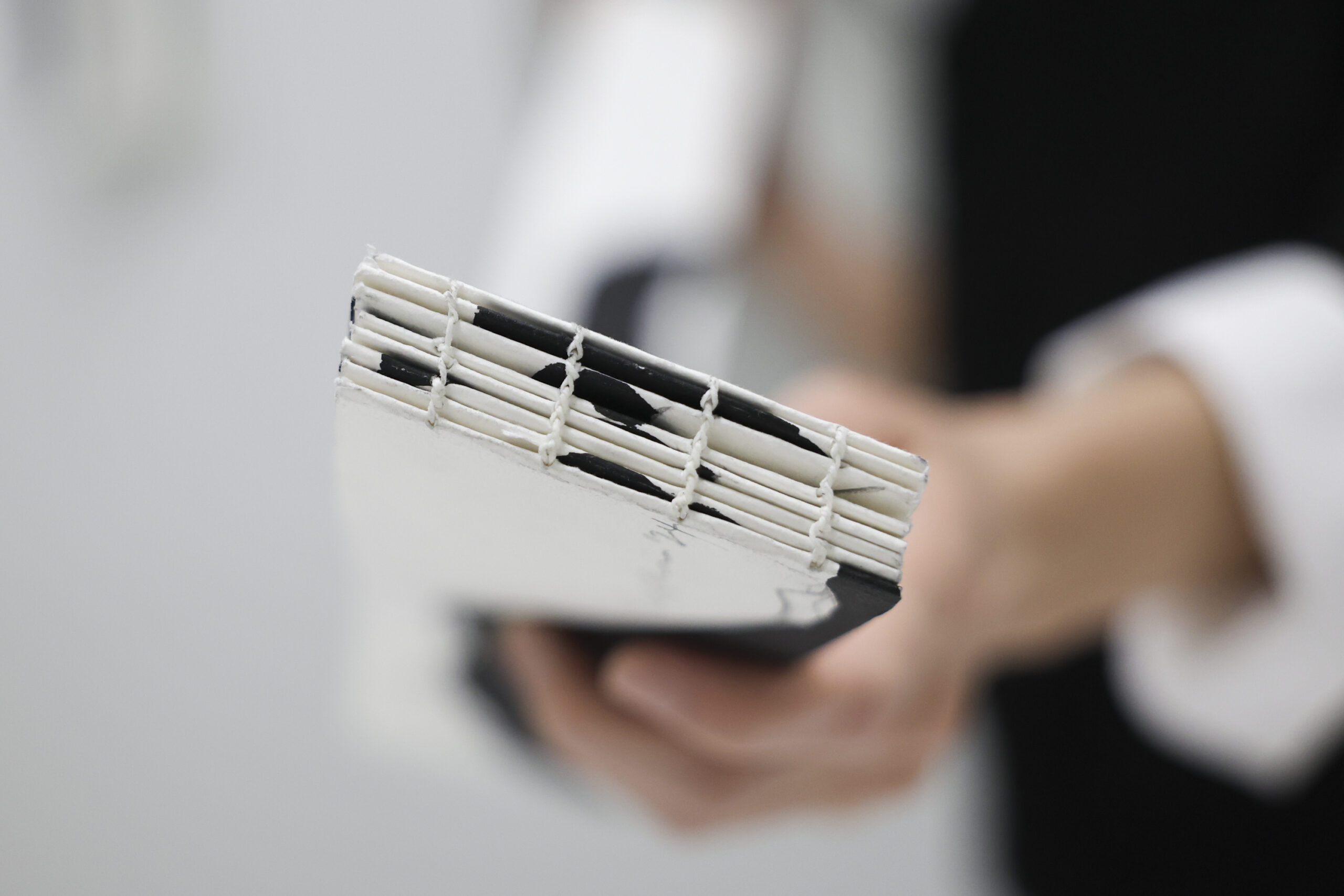 Yoonshin Park shows the binding on a prototype for one...