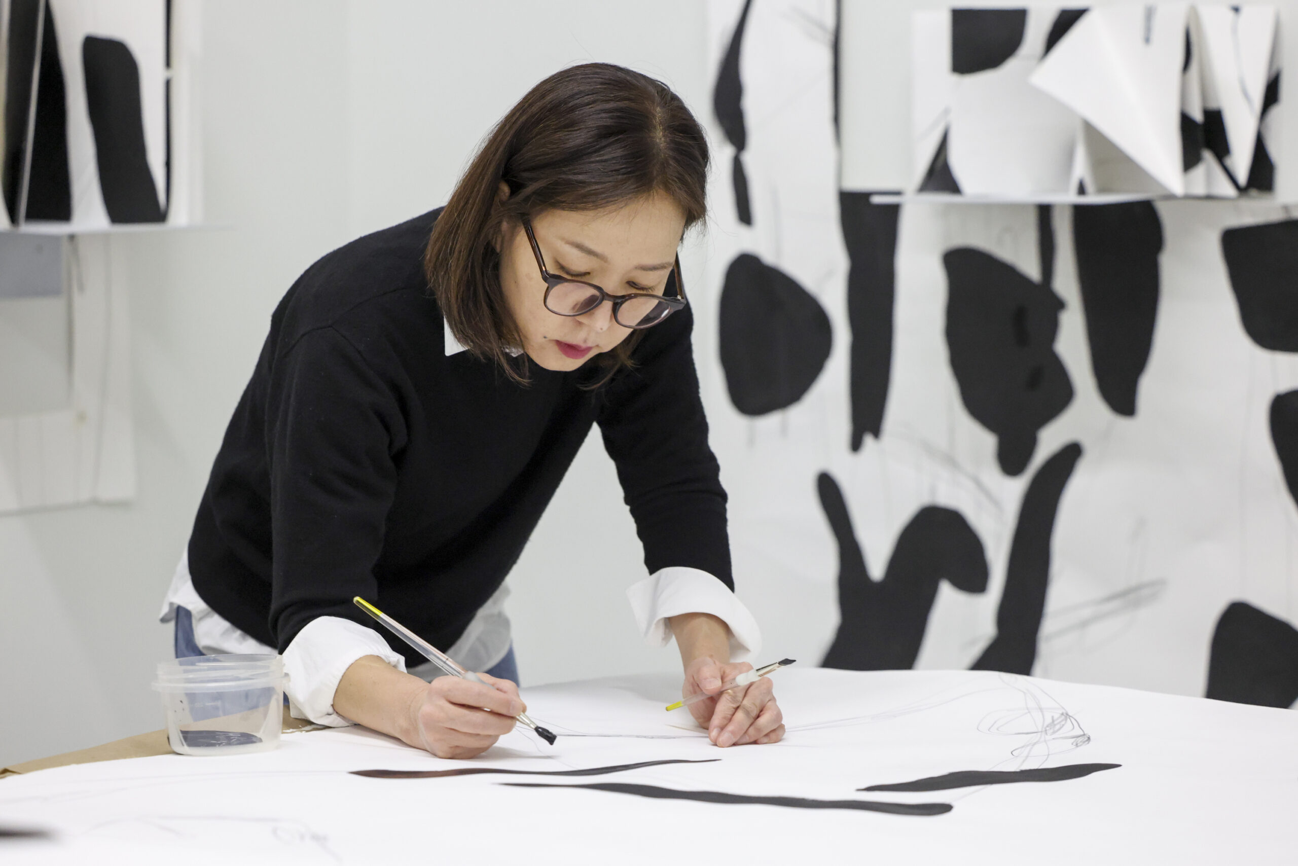 Yoonshin Park paints the last piece for her upcoming exhibition...