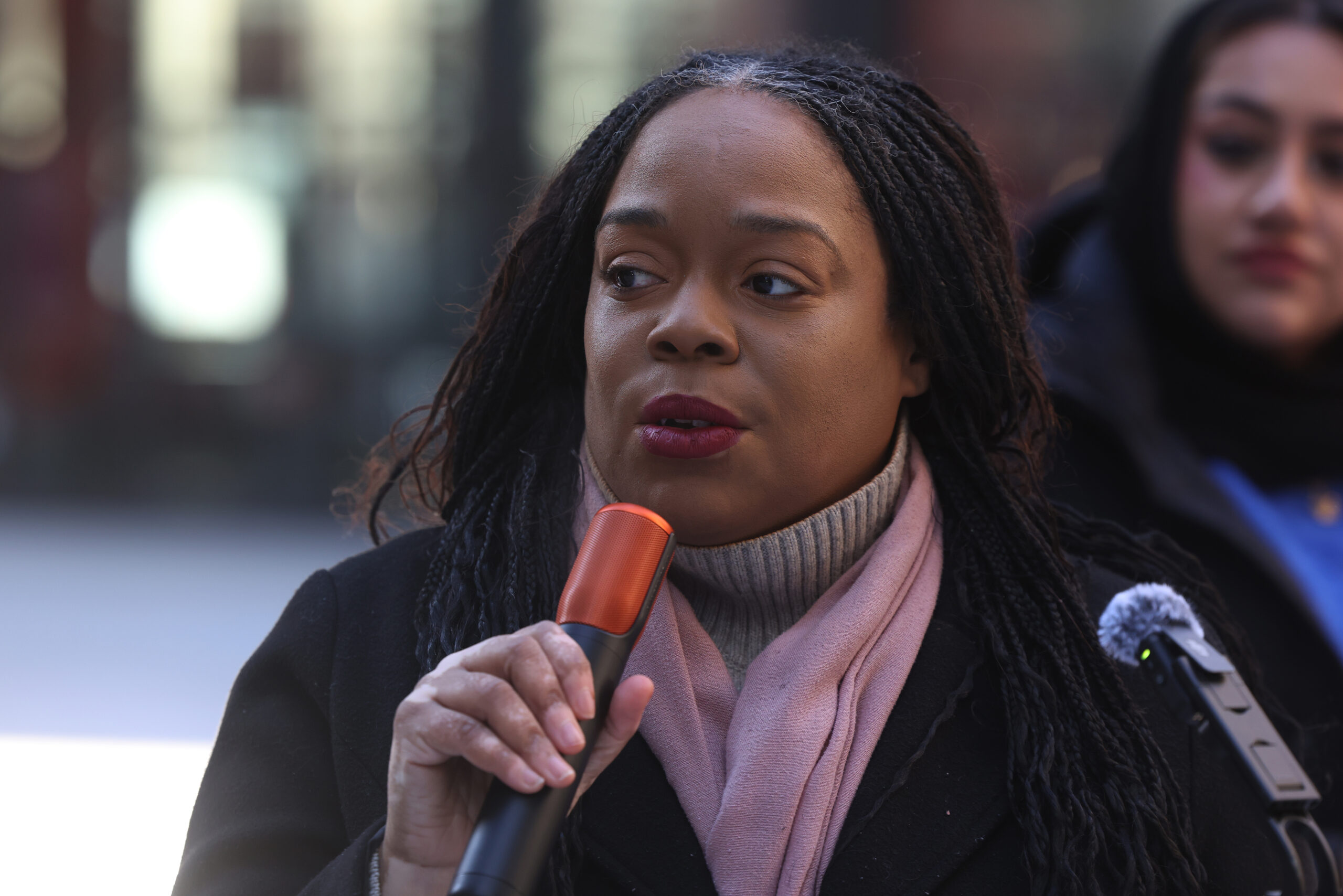 Kina Collins, a candidate for the 7th district, speaks at...